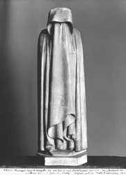 Veiled Mourner, hiding his face behind his veiled hands, from the tomb of Duc Jean de Berry before 1438
